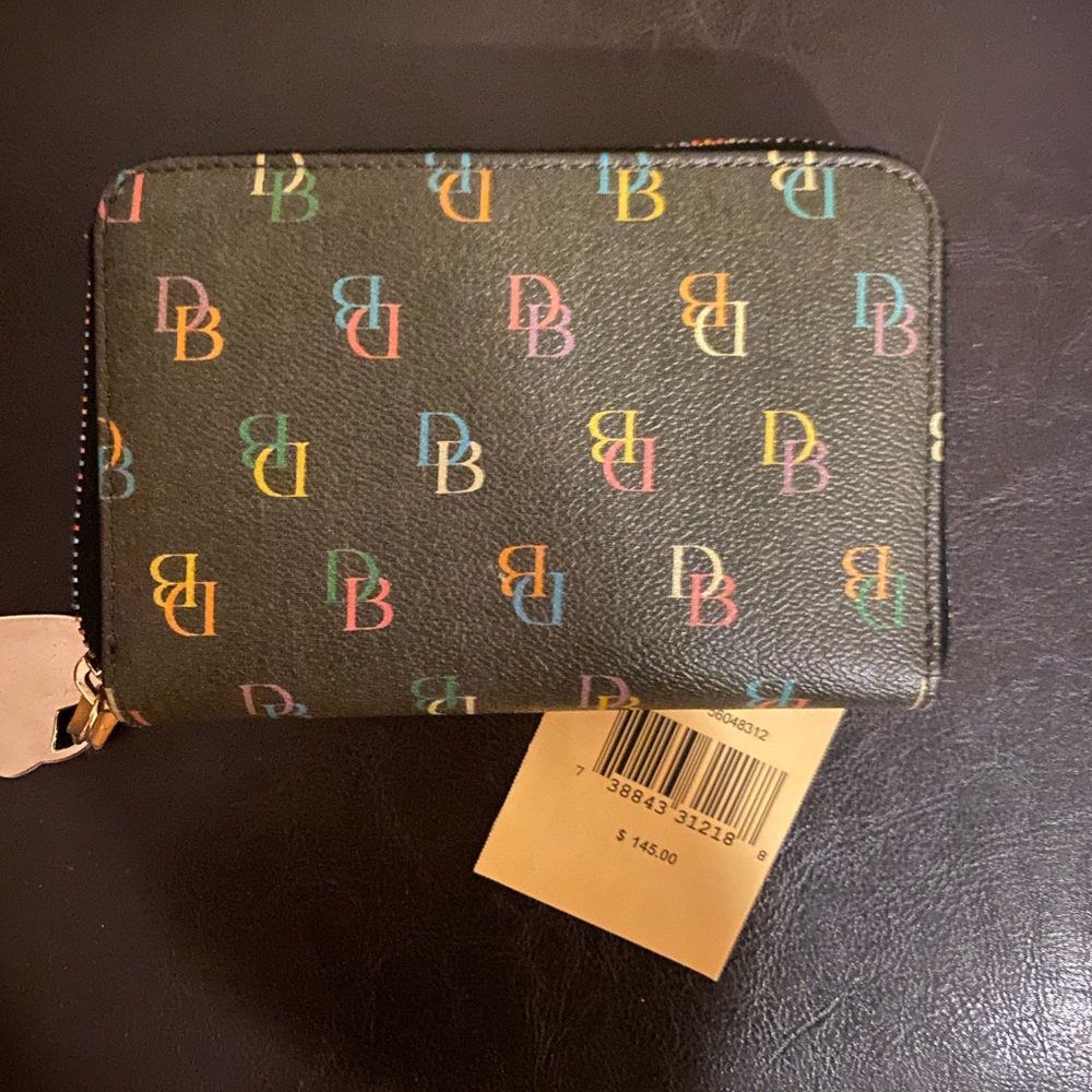 Dooney and Bourke multi colored signature wallet.